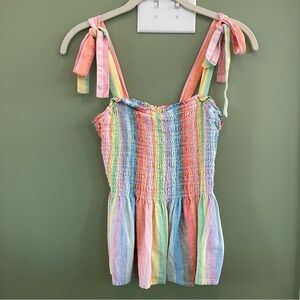 Rainbow tank top with tie straps and elasticized upper.